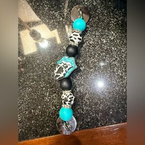 Leopard Print and Turquoise Beaded phone gripper.